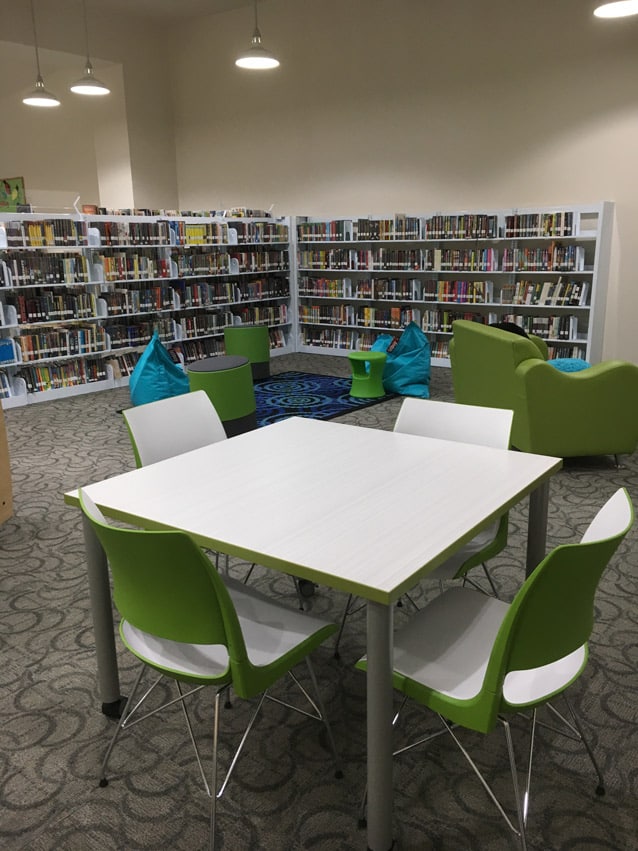 teen library area with books and tables