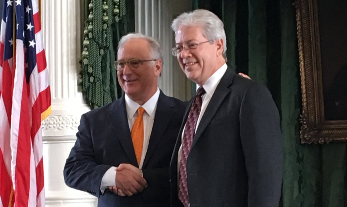 Darryl Tocker smiling in acceptance ceremony at the Office of the Texas Governer swearing in as Comissioner.